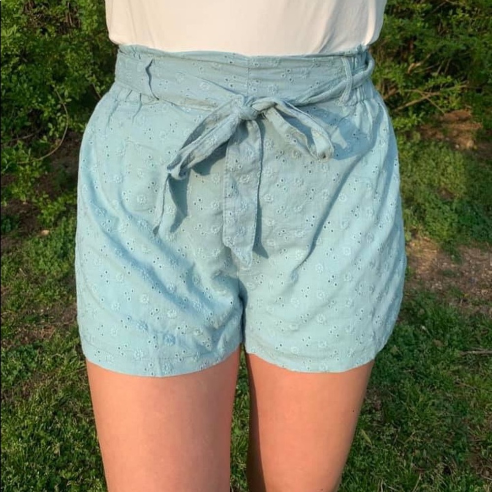 Blue eyelet waist tie shorts